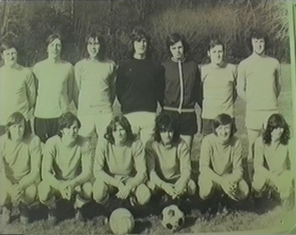 An early Killarney Athletic Kerry District League team posed with two footballs
